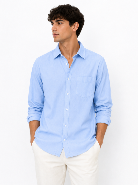 Refined and versatile Ted Bernhardtz long-sleeve shirt in a soft light blue color,